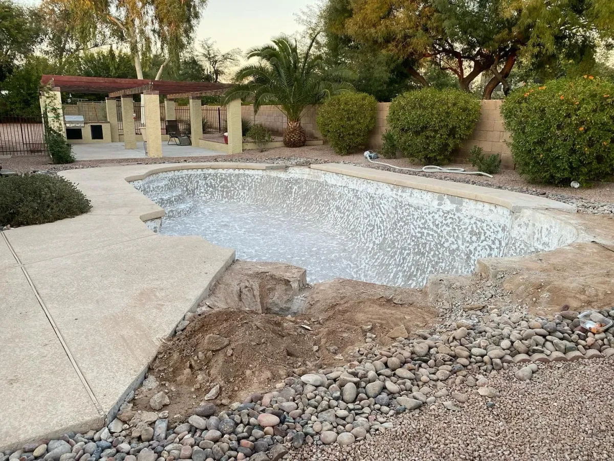 Pool before remodel, drained with fresh interior prep