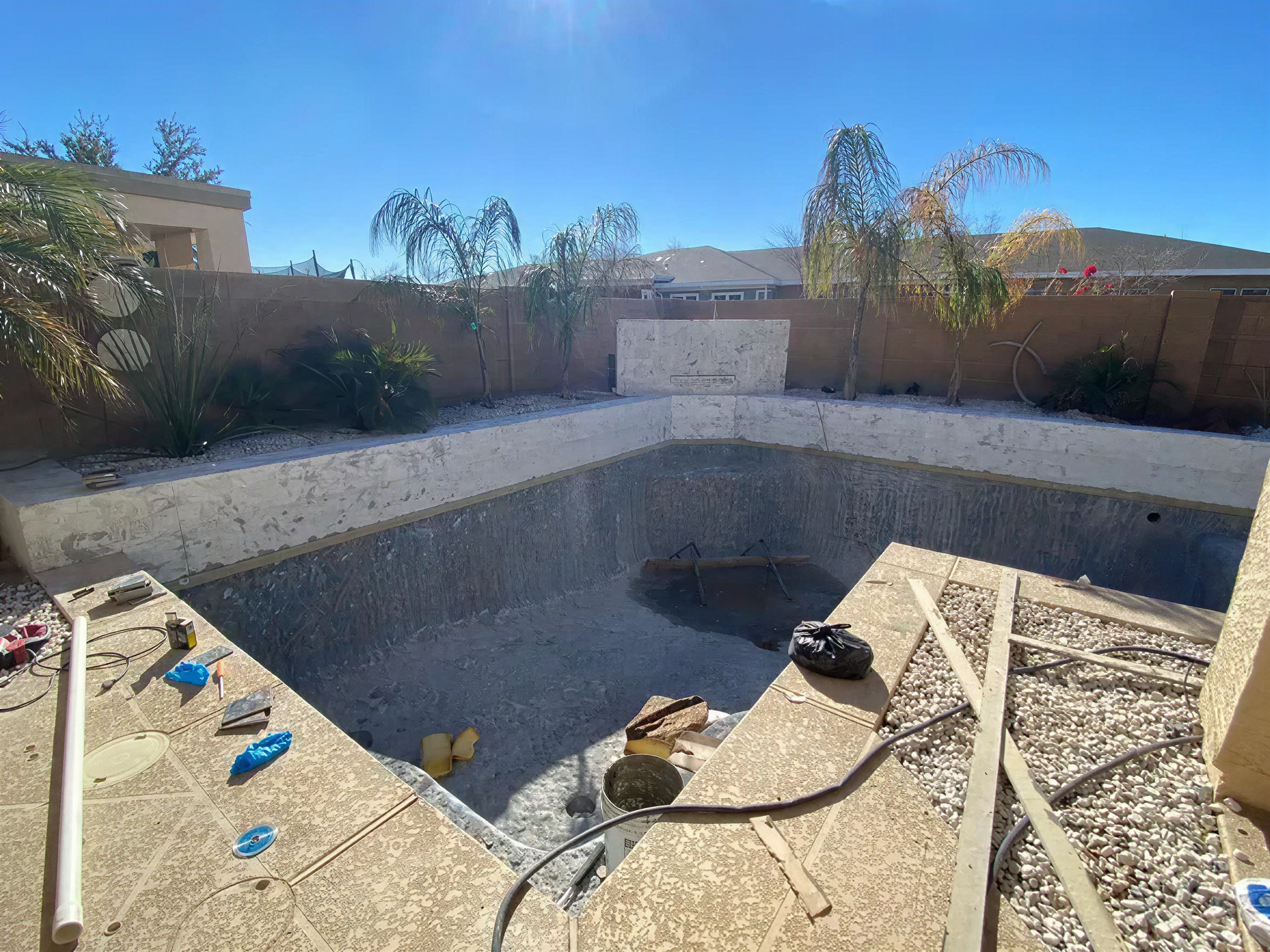 Courtyard pool shell during interior preparation
