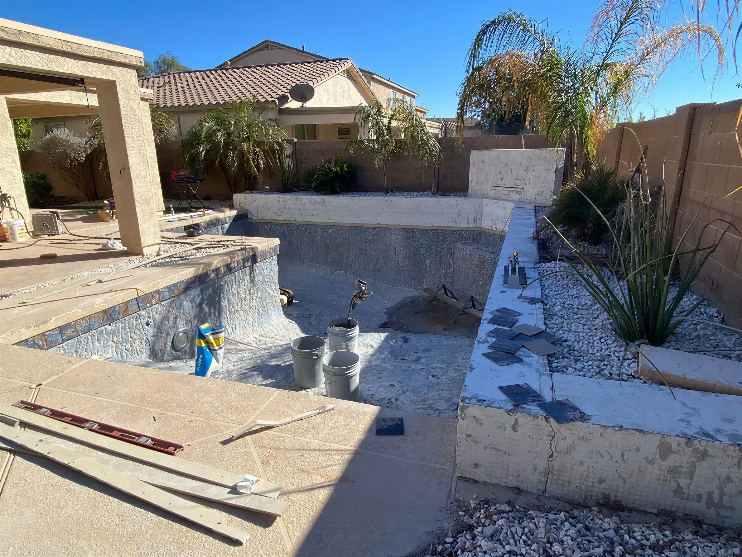 Existing courtyard pool during restoration work