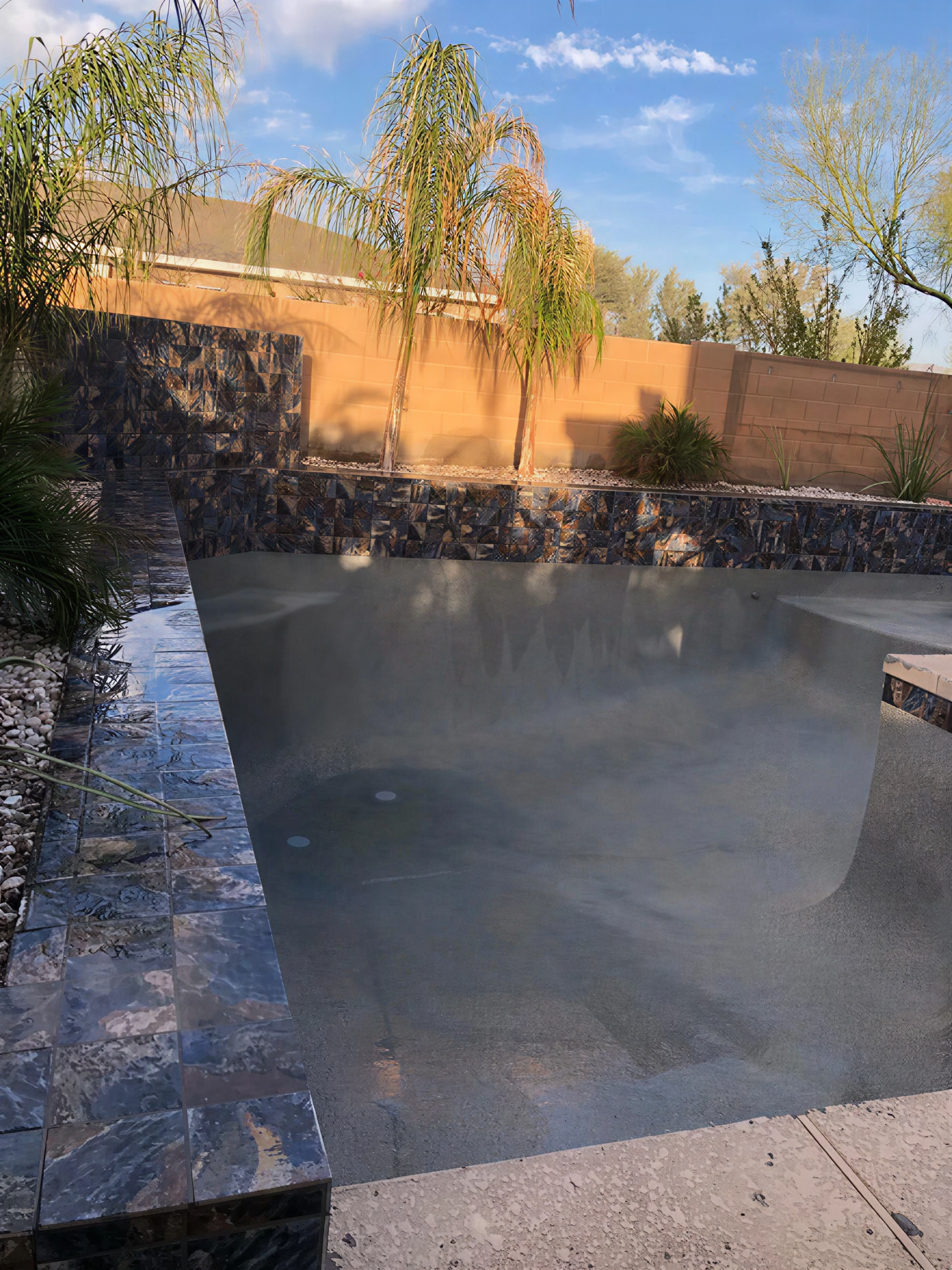 Courtyard pool during the finish-curing stage